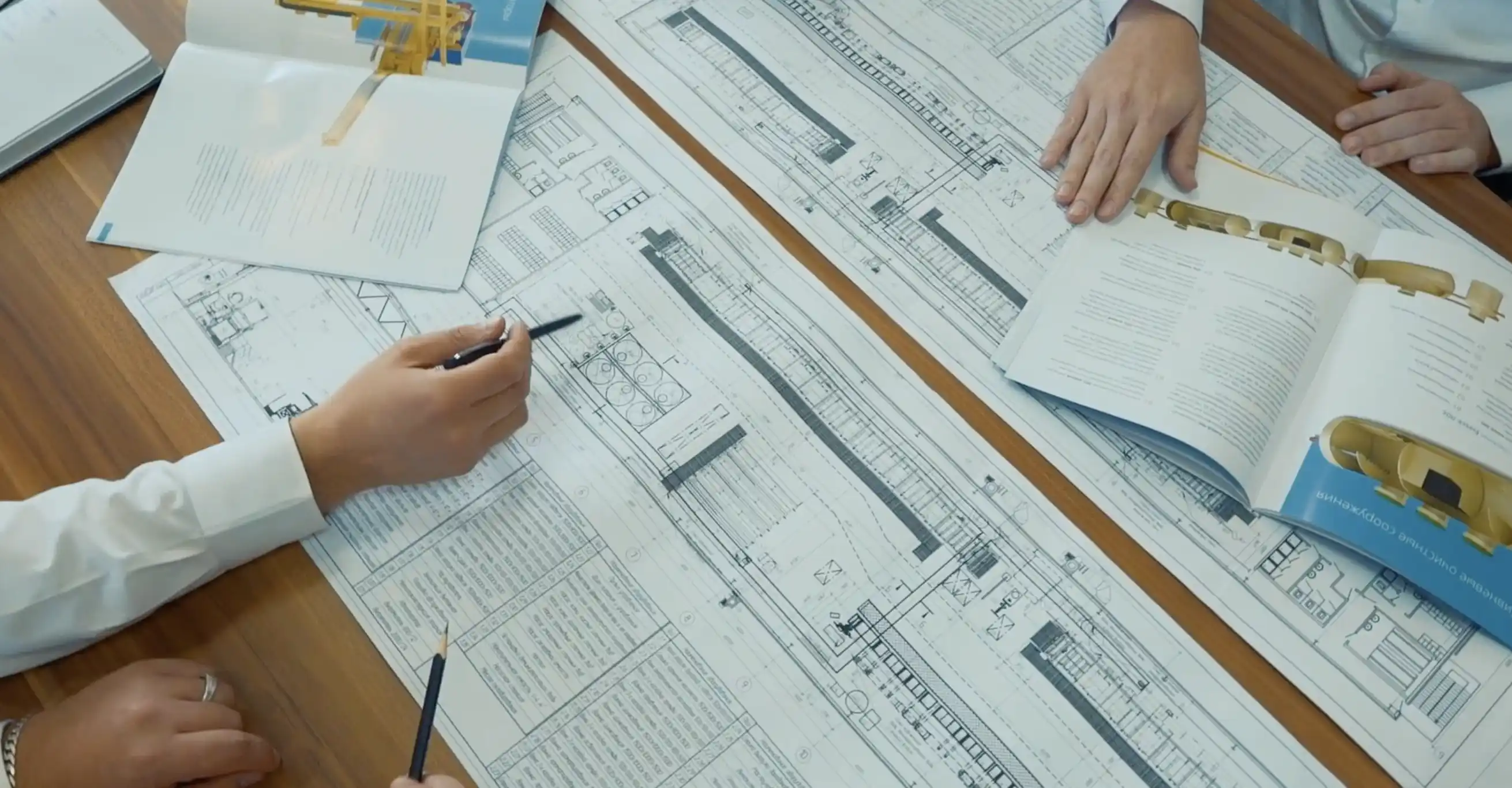EVESS engineers reviewing project drawings and technical documentation